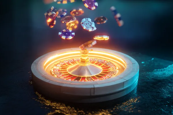 A player using their smartphone during a festive local event, representing TKPK’s fully mobile-friendly casino.